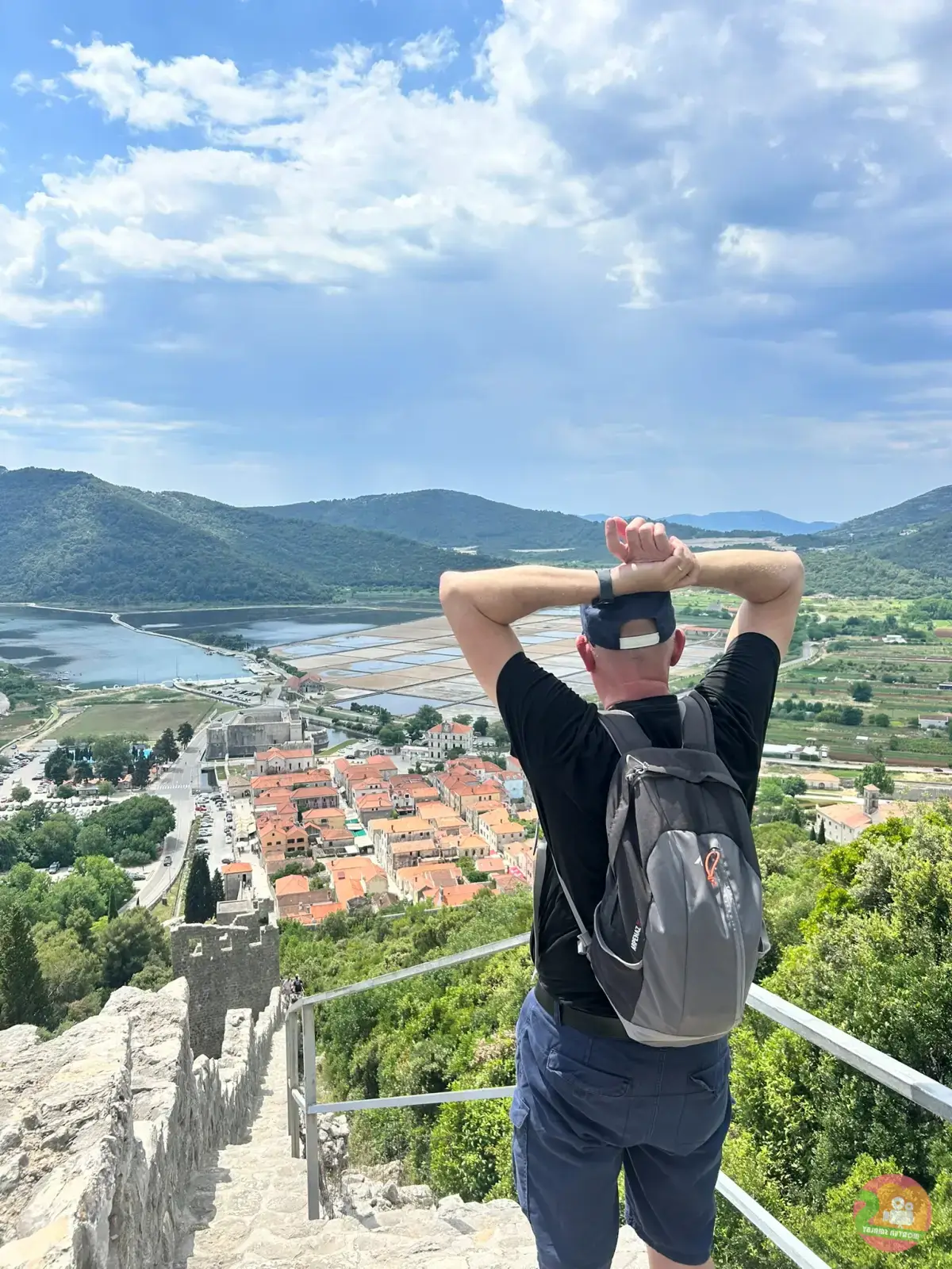 Morten Smalby catching his breath on the Ston wall, looking out over Ston and the salt pans